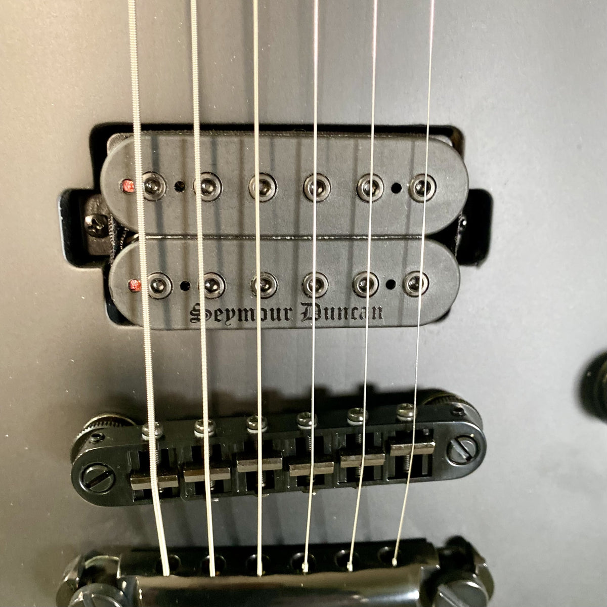 LTD EC Black Metal Seymour Duncan Blackened Black Winter humbucker and TonePros locking bridge
