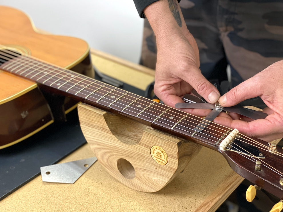 Checking 1st fret action with a feeler gauge
