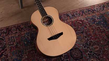 Faith Natural Titan Acoustic Bass Electro, lying on rug